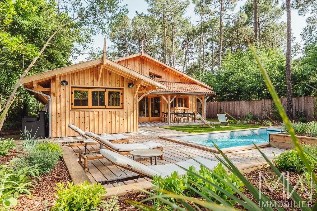 VILLA BOIS AVEC PISCINE – PETIT PIQUEY – 12 COUCHAGES