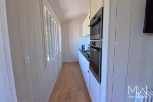CHARMANTE VILLA BOIS AU COEUR DU VILLAGE
