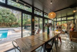 BELLE VILLA BOIS AVEC PISCINE AU PIED DES DUNES
